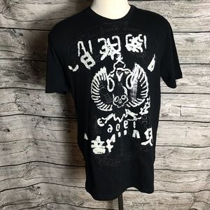Junior's Guess black t shirts size XL.Pit to pit approx:  22 inches Right sho
